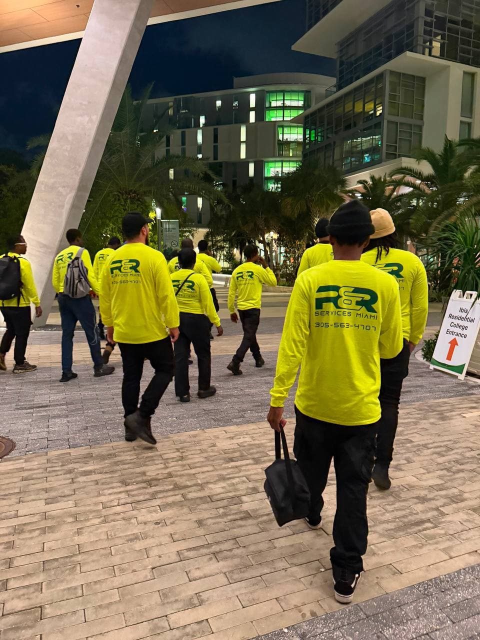 Uniformed janitorial team on site